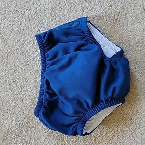 NWOT Green Sprouts 6 month Reusable swim diaper. Snaps on side Blue
